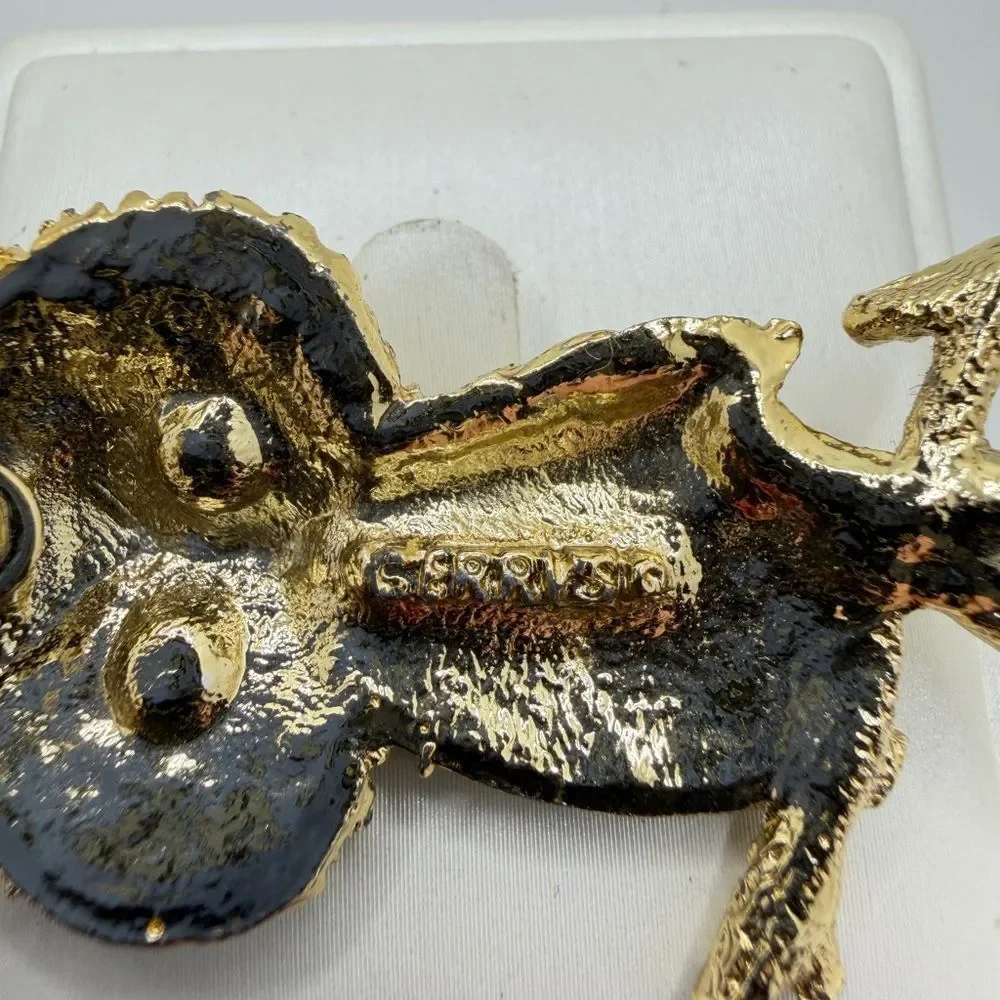 Vintage Gerry's gold tone owl‎ brooch/pin with red rhinestone eyes!